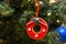 A festive Christmas wonderful toys in the form of gingerbread isolated on christmas tree background, Christmas tree ornament