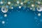 Festive Christmasr background with fir twigs, blue red and white paper decorations, copy-space