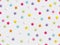 Festive colorful star confetti seamless pattern on white background. Vector illustration