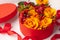 Festive composition with beautiful flowers and berries in red round box on white background. Flat lay, copy space