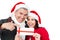 Festive couple pointing christmas gift