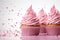 Festive cupcakes with pink cream and pink topping on a white background. Generated by artificial intelligence