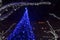 Festive decorated Christmas tree with blue led lights