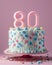 A festive delicious birthday cake with number 80 candle