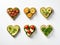 Festive delicious toasts with vegetables, heart-shaped, on white background