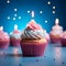 Festive delight Birthday cupcake with pink cream on blue background