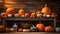 A festive display of pumpkins on a rustic wooden table