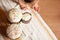 Festive Easter cakes with white icing and sprinkling, festive composition. The hand of a child, The image of family and home