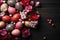 Festive Easter Eggs Amidst Blossoms on Dark Wooden Background