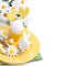 Festive Easter table setting with egg, white rabbit and flowers