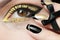 Festive fashion black gold make up and French manicure