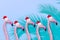 Festive flamingo Greeting or Christmas card with funny animals in xmas santa hats with space for a message