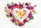 Festive floral composition with heart from wooden branches