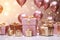 festive gift boxes, with pink and gold balloons with space for text. holiday, sales concept