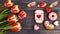 Festive gift gingerbread for Valentine\\\'s Day in the form of a cup of coffee, hearts, a donut, a bouquet of tulips