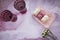 Festive glasses of wine and tender pink and white marshmallow with decoration of dryflowers. Feminine card concept. Cozy