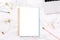 Festive golden stationary on white marble with Work from home wording. Feminine job, home office, distancing, social