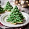 Festive Green Frosted Christmas Tree Cookies On Colorful Plate