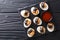 Festive Halloween appetizer: halved devil`s eggs decorated with