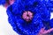 Festive handmade crocheted blue flowers, ribbon, roses, poppy composition on the white background. Birthday, Mother`s, Valentines