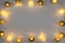 Festive included garland on gray background flat lay top view. Cotton Balls Garland. Round bulbs LED festoon electric garland.