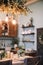 Festive kitchen in Christmas decorations.  Beautiful New Year decorated classic home interior. New Year and Christmas background