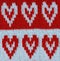 Festive knitted background with red hearts