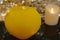 festive light bulbs on a bokeh background, a garland on a yellow background,
