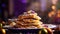 Festive Mardi Gras pancakes, topped with golden syrup and colorful beads