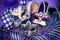 Festive mardi gras, venetian or carnivale mask on a purple background. Top view