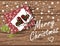 Festive Merry Christmas card with gift box on wooden table and greeting lettering. Vector flat lay