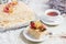 Festive Napoleon cake with custard and berries on top for Christmas and New Year. Selective focus.