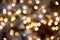 Festive New-year background with bokeh from Christmas tree lights glowing. Blurred colorful circles on light holiday