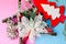 Festive New Year Christmas happy blue and pink beautiful joyful background with thinking small wooden and metal toy homemade tree