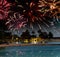 Festive New Year\'s fireworks over the tropical island