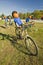 A festive pumpkin rides a bicycle along Crawford Notch, New Hampshire