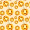 Festive pumpkin smiles on Halloween holiday. Watercolor illustration isolated on yellow background.Seamless pattern