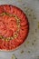 Festive Quince tart tatin, beautiful and delicious  dessert for the Holidays, garnished with green pistachios