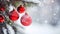 Festive Radiance: Red Ornaments Amidst Snowy Fir Branches