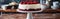 Festive Red Velvet Cake on White Stand for Celebration and Occasion