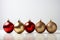 Festive Reflections: Vibrant Red and Gold Christmas Ornaments on Silver Branch