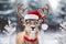 A festive reindeer wearing a Christmas santa hat stood in a snowy forest