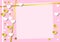 Festive romantic pink background with frame of white hearts and confetti and golden stripes