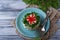 Festive salad decorated parsley and flower of pepper