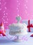 A festive sponge cake with white cream for a birthday, on a pink and blue background. Tinsel, waverki and boxes of gifts. Question