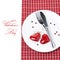 Festive table setting for Valentine\'s Day with fork, knife