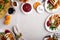 Festive Thankgiving dinner table with plates of food