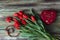 Festive tulips on wooden background