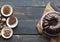 FestiveFestive homemade cakes. Round chocolate muffin, large muffin or cake with chocolate icing on a dark wooden background.