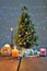 Festively decorated Christmas tree with candles and illumination